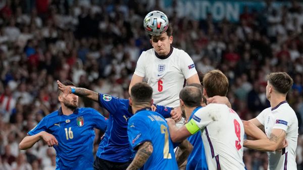 Harry Maguire heads the ball for England against Italy in Euro 2020 final - Sputnik International