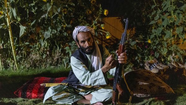 A militaman loads his rifle as Afghan Special Forces visit a district centre during a combat mission against Taliban, in Kandahar province, Afghanistan, July 12, 2021 - Sputnik International