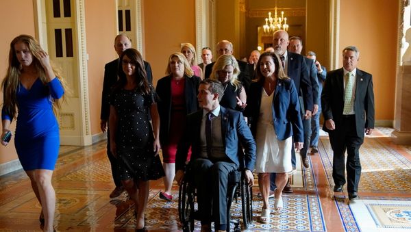 House Republicans, including Representatives Lauren Boebert (R-CO), Kat Cammack (R-FL), Madison Cawthorn (R-NC), Marjorie Taylor Greene (R-GA), Lisa McClain (R-MI) and Jody Hice (R-GA), who oppose mask mandates march as a group to the Senate chamber to highlight different coronavirus disease (COVID-19) mask rules between the House and Senate sides of the U.S. Capitol in Washington, U.S., July 29, 2021.  - Sputnik International