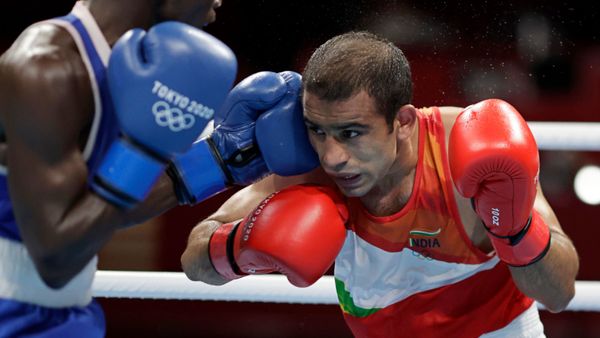 Tokyo 2020 Olympics - Boxing - Men's Flyweight - Last 16 - KKG - Kokugikan Arena - Tokyo, Japan - July 31, 2021. Amit Panghal of India in action against Yuberjen Martinez Rivas of Colombia REUTERS/Ueslei Marcelino Tokyo 2020 Olympics - Boxing - Men's Flyweight - Last 16 - KKG - Kokugikan Arena - Tokyo, Japan - July 31, 2021. Amit Panghal of India in action against Yuberjen Martinez Rivas of Colombia REUTERS/Ueslei Marcelino - Sputnik International