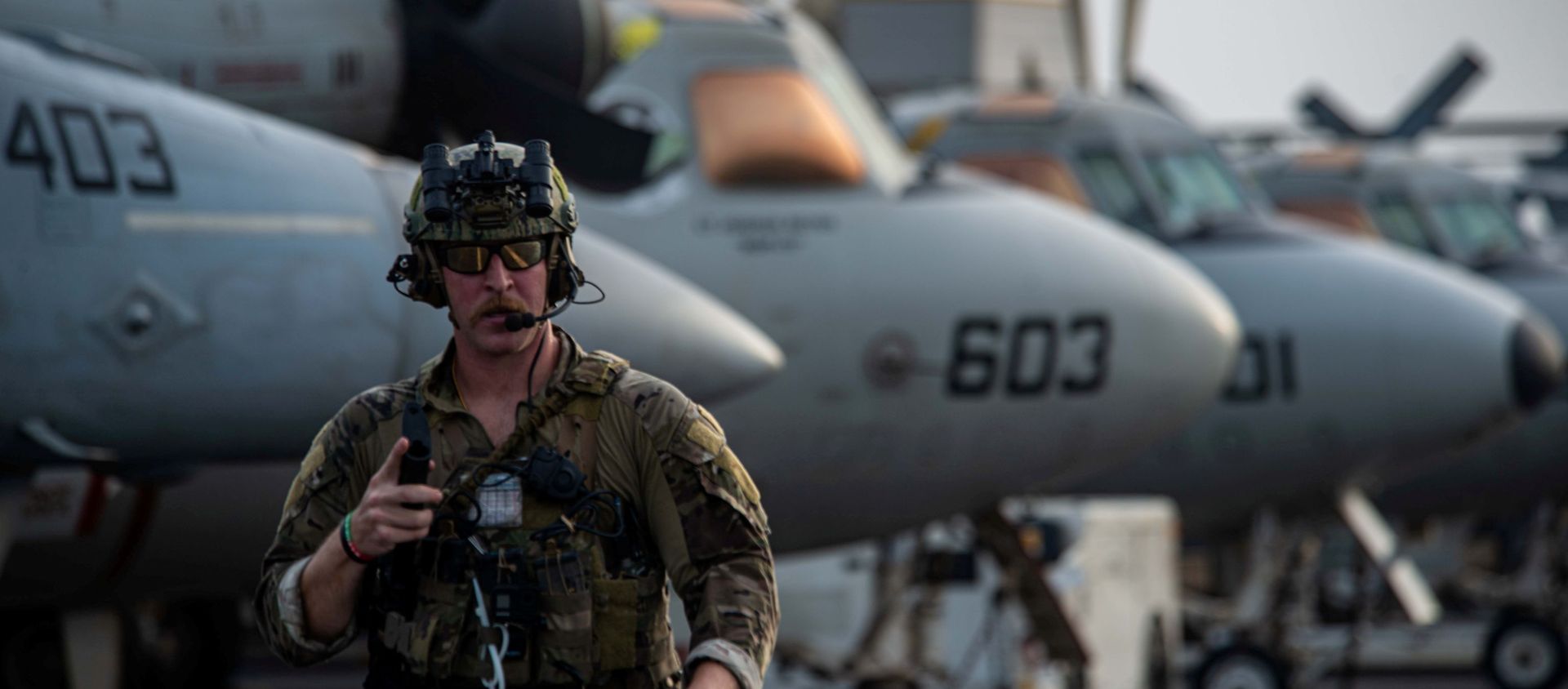 Explosive Ordnance Disposal Technician 3rd Class Ethan Tews, assigned to Explosive Ordnance Disposal Mobile Unit (EODMU) 5, walks across the flight deck of aircraft carrier USS Ronald Reagan (CVN 76) in response to a call for assistance from the Mercer Street, a Japanese-owned Liberian-flagged tanker managed by Israeli-owned Zodiac Maritime, in the Arabian Sea, July 30, 2021 - Sputnik International, 1920, 01.08.2021