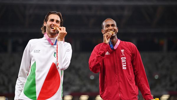 Tokyo 2020 Olympics - Athletics - Men's High Jump - Medal Ceremony - Olympic Stadium, Tokyo, Japan – August 2, 2021. Gold medallists, Gianmarco Tamberi of Italy and Mutaz Essa Barshim of Qatar pose on the podium - Sputnik International
