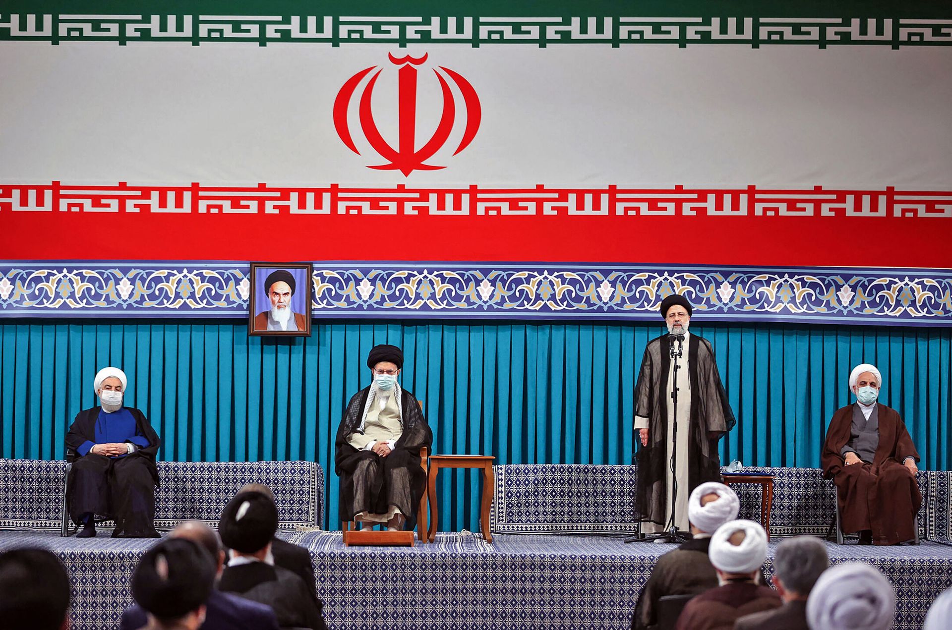 A handout picture provided by the office of Iran's Supreme Leader Ayatollah Ali Khamenei on August, 3 2021 shows him (C L) flanked by outgoing president Hassan Rouhani (L) during the inauguration ceremony for Ebrahim Raisi (C R) in the presence of the head of judiciary authority Gholamhossein Mohseni-Ejei (R) in Khamenei's office in the capital Tehran. - Sputnik International, 1920, 07.09.2021