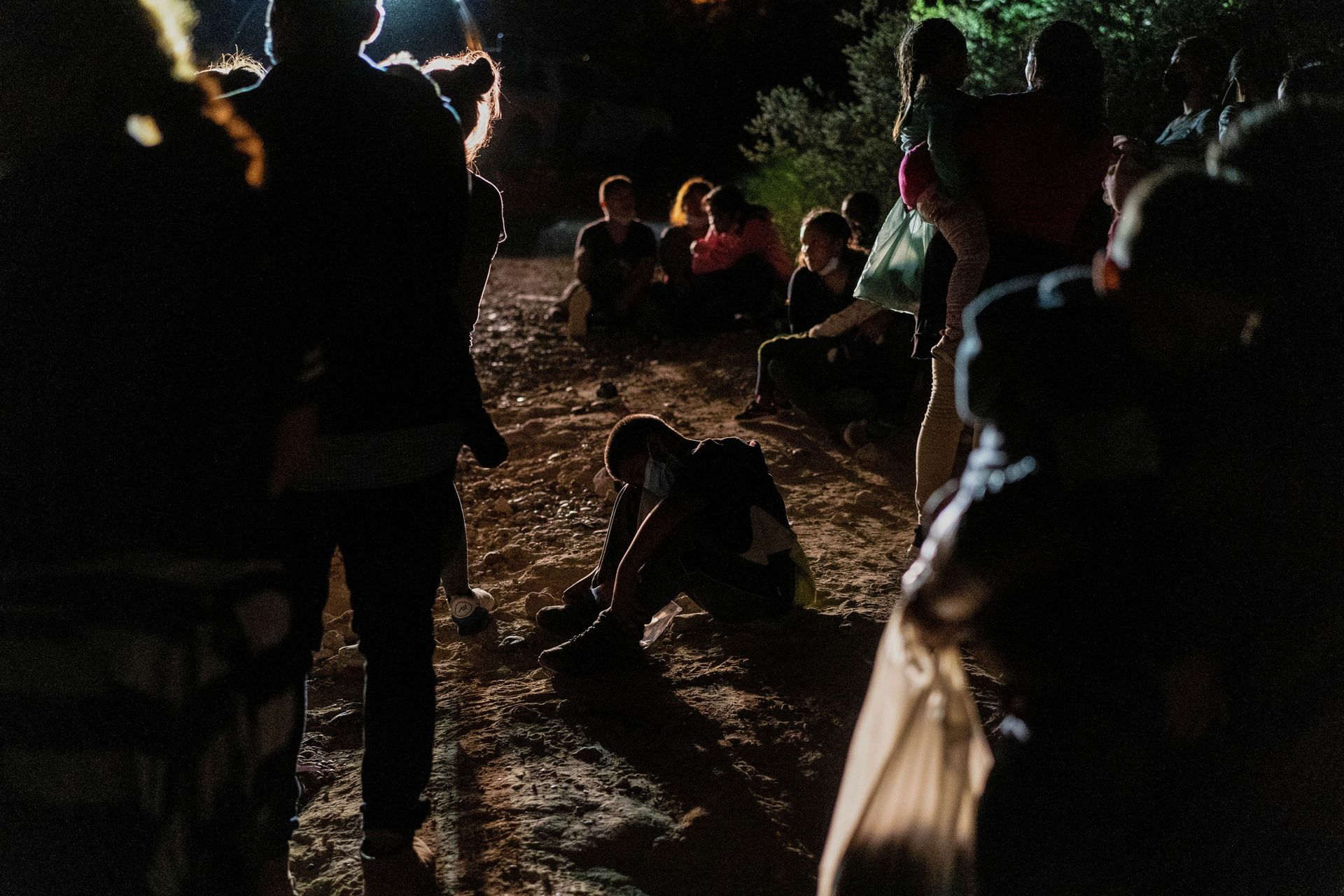 Asylum-seeking migrant families from Central America wait to be processed by the U.S. Border Patrol agents after crossing the Rio Grande river into the United States of America from Mexico in Roma, Texas, U.S., July 28, 2021. Asylum-seeking migrant families from Central America wait to be processed by the U.S. Border Patrol agents after crossing the Rio Grande river into the United States of America from Mexico in Roma, Texas, U.S., July 28, 2021. - Sputnik International, 1920, 07.09.2021