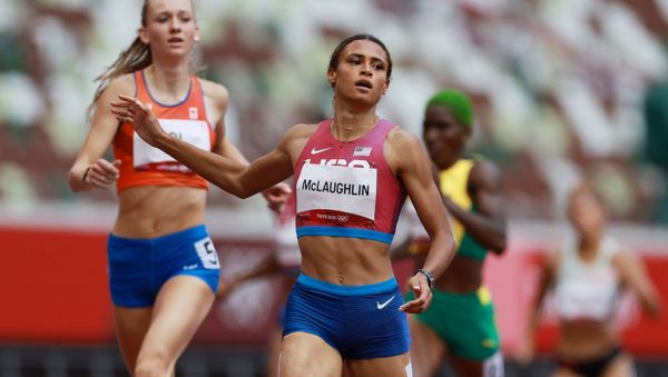 Sydney McLaughlin of the United States crosses the line to win gold Sydney McLaughlin of the United States crosses the line to win gold - Sputnik International