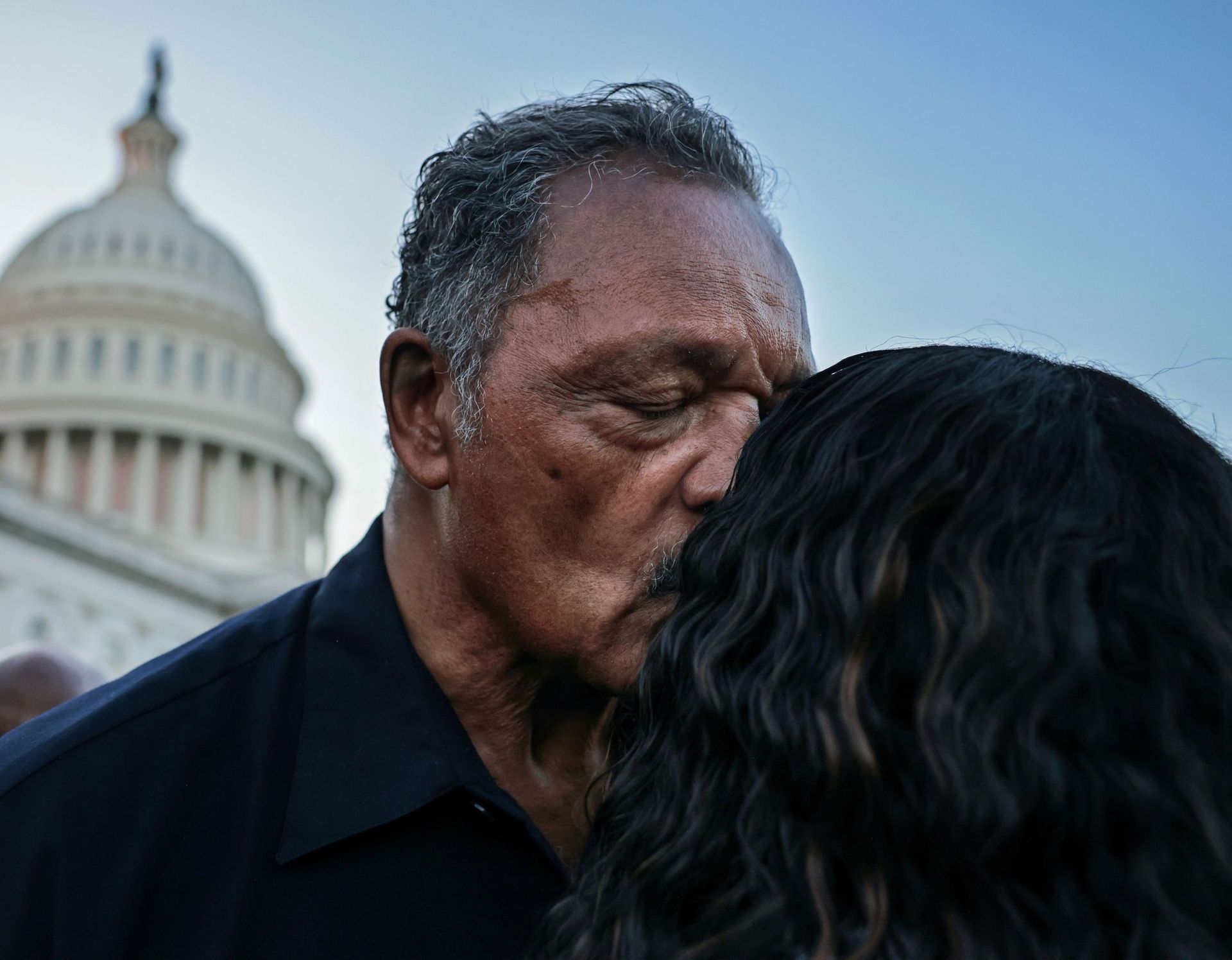 Reverend Jesse Jackson kisses the head of Representative Cori Bush (D-MO) outside the U.S. Capitol, before he leaves a demonstration where she has been spending the night to protest the expiration of the federal moratorium on residential evictions, in Washington, U.S., August 2, 2021. Reverend Jesse Jackson kisses the head of Representative Cori Bush (D-MO) outside the U.S. Capitol, before he leaves a demonstration where she has been spending the night to protest the expiration of the federal moratorium on residential evictions, in Washington, U.S., August 2, 2021. - Sputnik International, 1920, 07.09.2021