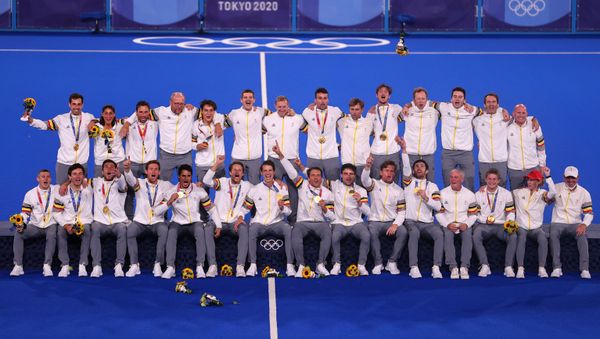 The players and staff of Belgium celebrate as they pose for pictures on the podium after receiving their gold medals.  - Sputnik International