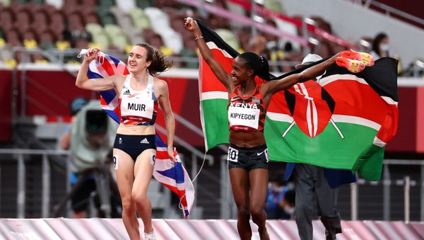 Tokyo 2020 Olympics - Athletics - Women's 1500m - Final - Olympic Stadium, Tokyo, Japan - August 6, 2021. Gold medallist Faith Kipyegon of Kenya celebrates with silver medallist, Laura Muir of Britain - Sputnik International