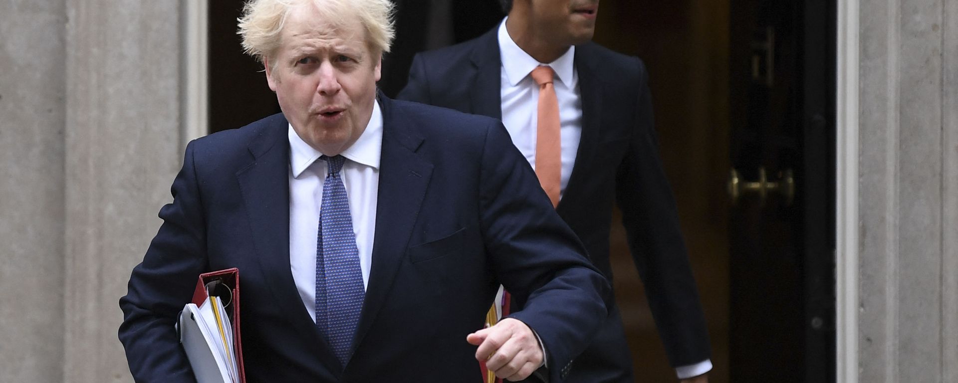 Britain's Prime Minister Boris Johnson (L) and Britain's Chancellor of the Exchequer Rishi Sunak (R) leave 10 Downing Street to attend the weekly cabinet meeting in London on October 13, 2020 held at the Foreign, Commonwealth and Development Office - Sputnik International, 1920, 12.06.2022
