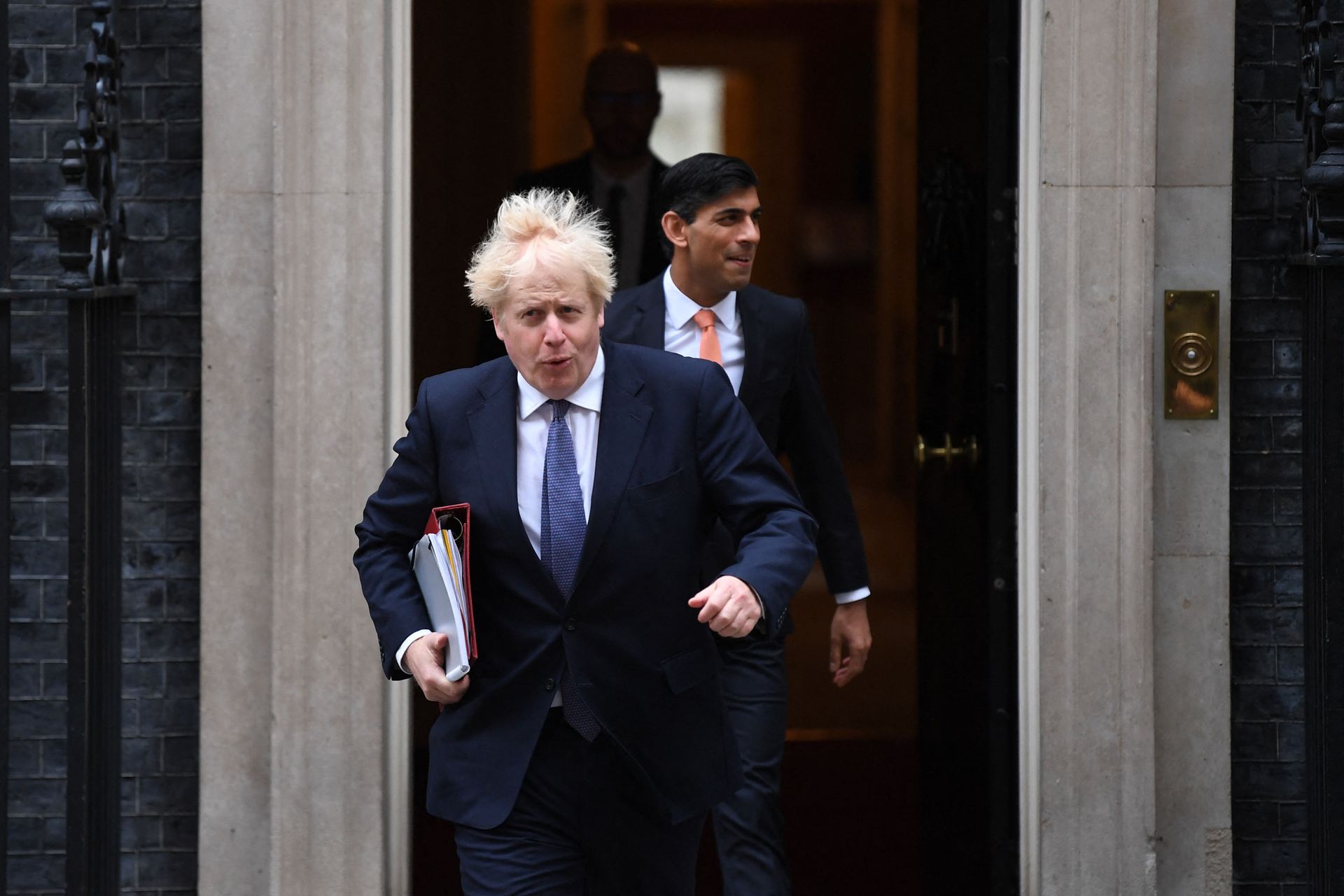 Britain's Prime Minister Boris Johnson (L) and Britain's Chancellor of the Exchequer Rishi Sunak (R) leave 10 Downing Street to attend the weekly cabinet meeting in London on October 13, 2020 held at the Foreign, Commonwealth and Development Office Britain's Prime Minister Boris Johnson (L) and Britain's Chancellor of the Exchequer Rishi Sunak (R) leave 10 Downing Street to attend the weekly cabinet meeting in London on October 13, 2020 held at the Foreign, Commonwealth and Development Office - Sputnik International, 1920, 15.09.2021