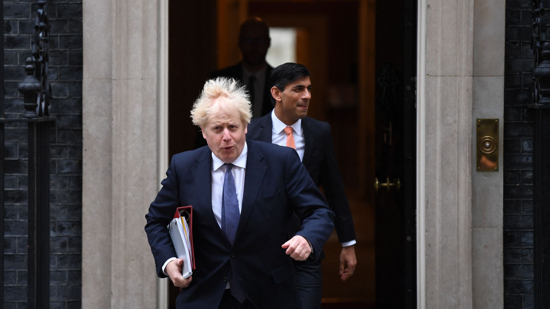 Britain's Prime Minister Boris Johnson (L) and Britain's Chancellor of the Exchequer Rishi Sunak (R) leave 10 Downing Street to attend the weekly cabinet meeting in London on October 13, 2020 held at the Foreign, Commonwealth and Development Office - Sputnik International, 1920, 08.08.2021