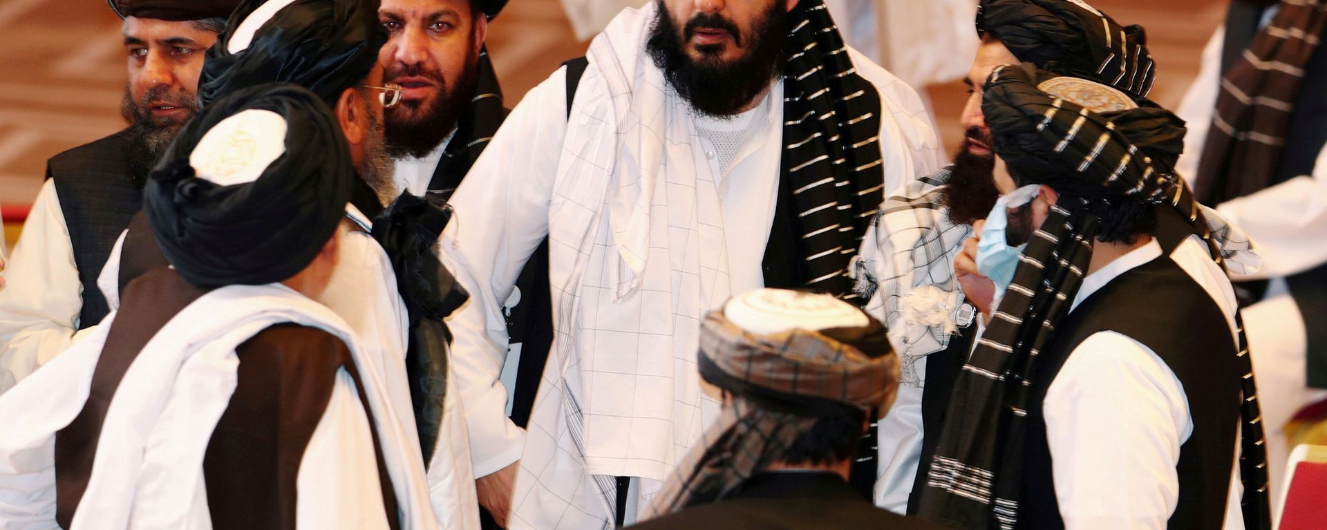 FILE PHOTO: Taliban delegates speak during talks between the Afghan government and Taliban insurgents in Doha, Qatar September 12, 2020. FILE PHOTO: Taliban delegates speak during talks between the Afghan government and Taliban insurgents in Doha, Qatar September 12, 2020. - Sputnik International, 1920, 24.11.2021
