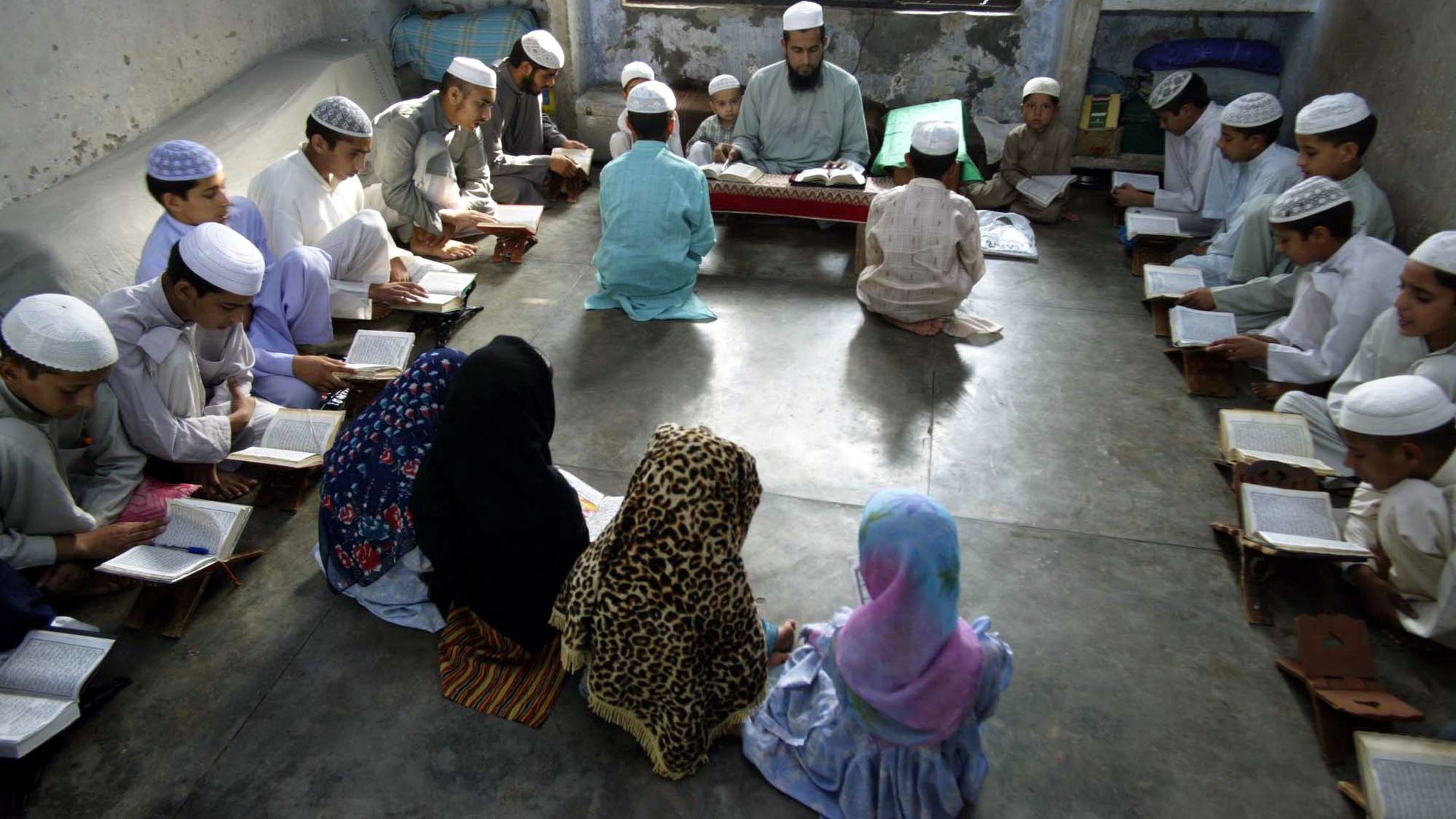 Muslim students from remote hilly areas of Jammu study inside a madrasa, or religious school, on the outskirts of Jammu, India, Saturday, July 1, 2006 Muslim students from remote hilly areas of Jammu study inside a madrasa, or religious school, on the outskirts of Jammu, India, Saturday, July 1, 2006 - Sputnik International, 1920, 31.08.2022