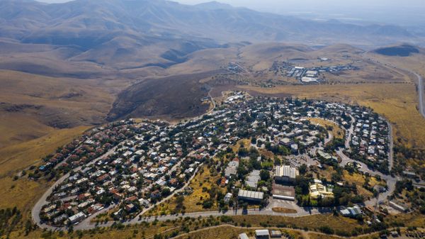 This June 30, 2020, file photo, shows a view of the West Bank Jewish settlement of Ma'ale Efrayim in the Jordan Valley. One of the world's best-known human rights groups says Israel is guilty of the international crimes of apartheid and persecution. Human Rights Watch cites discriminatory policies toward Palestinians within Israel's own borders and in the occupied territories. In so doing, the New York-based group joins a growing number of commentators and rights groups that consider Israel and the territories as a single entity in which Palestinians are denied basic rights that are granted to Jews. (AP Photo/Oded Balilty, File) - Sputnik International