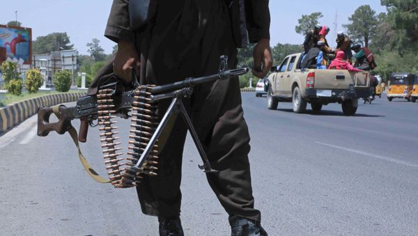 A Taliban fighter stands guard on a street in Herat on August 14, 2021 A Taliban fighter stands guard on a street in Herat on August 14, 2021 - Sputnik International