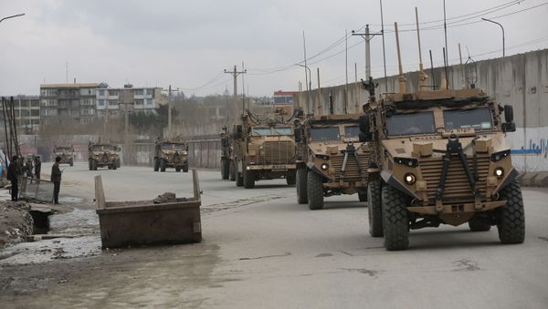 In this file photo dated Wednesday, March 25, 2020, British troops with NATO-led Resolute Support Mission forces travel, in Kabul, Afghanistan. Dozens of former military commanders are calling on the U.K. government to relocate more of the Afghans who worked with British troops over the last 20 years, arguing that they are likely to be murdered by the Taliban as foreign forces pull out. Retired Gen. Richard Dannatt, the former chief of the General Staff, and other senior leaders of the campaign in Afghanistan, are urging the government to expand its relocation program to include interpreters and other support staff who were dismissed for minor infractions.  - Sputnik International