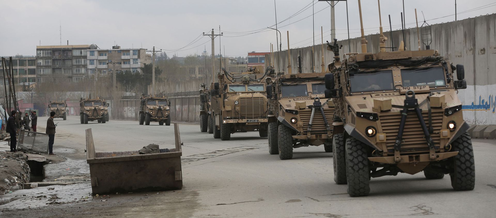 In this file photo dated Wednesday, March 25, 2020, British troops with NATO-led Resolute Support Mission forces travel, in Kabul, Afghanistan. Dozens of former military commanders are calling on the U.K. government to relocate more of the Afghans who worked with British troops over the last 20 years, arguing that they are likely to be murdered by the Taliban as foreign forces pull out. Retired Gen. Richard Dannatt, the former chief of the General Staff, and other senior leaders of the campaign in Afghanistan, are urging the government to expand its relocation program to include interpreters and other support staff who were dismissed for minor infractions. In this file photo dated Wednesday, March 25, 2020, British troops with NATO-led Resolute Support Mission forces travel, in Kabul, Afghanistan. Dozens of former military commanders are calling on the U.K. government to relocate more of the Afghans who worked with British troops over the last 20 years, arguing that they are likely to be murdered by the Taliban as foreign forces pull out. Retired Gen. Richard Dannatt, the former chief of the General Staff, and other senior leaders of the campaign in Afghanistan, are urging the government to expand its relocation program to include interpreters and other support staff who were dismissed for minor infractions. - Sputnik International, 1920, 14.08.2021