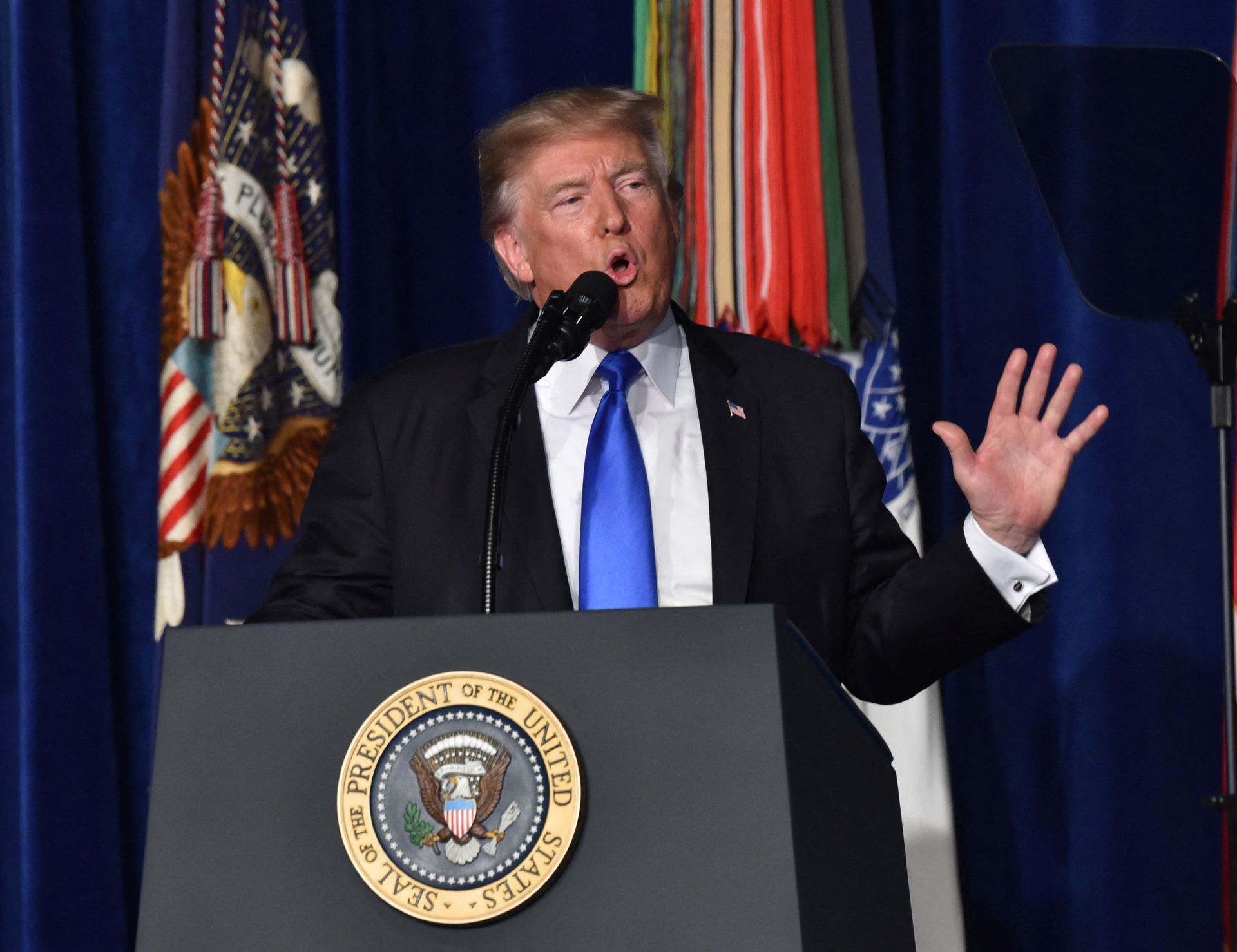 US President Donald Trump speaks during his address to the nation from Joint Base Myer-Henderson Hall in Arlington, Virginia, on August 21, 2017. - Trump Monday left the door open to a possible political agreement with the Taliban, in an address to the nation on America's strategy in the 16-year Afghan conflict. Some day, after an effective military effort, perhaps it will be possible to have a political sentiment that includes elements of the Taliban in Afghanistan, he said. US President Donald Trump speaks during his address to the nation from Joint Base Myer-Henderson Hall in Arlington, Virginia, on August 21, 2017. - Trump Monday left the door open to a possible political agreement with the Taliban, in an address to the nation on America's strategy in the 16-year Afghan conflict. Some day, after an effective military effort, perhaps it will be possible to have a political sentiment that includes elements of the Taliban in Afghanistan, he said. - Sputnik International, 1920, 07.09.2021