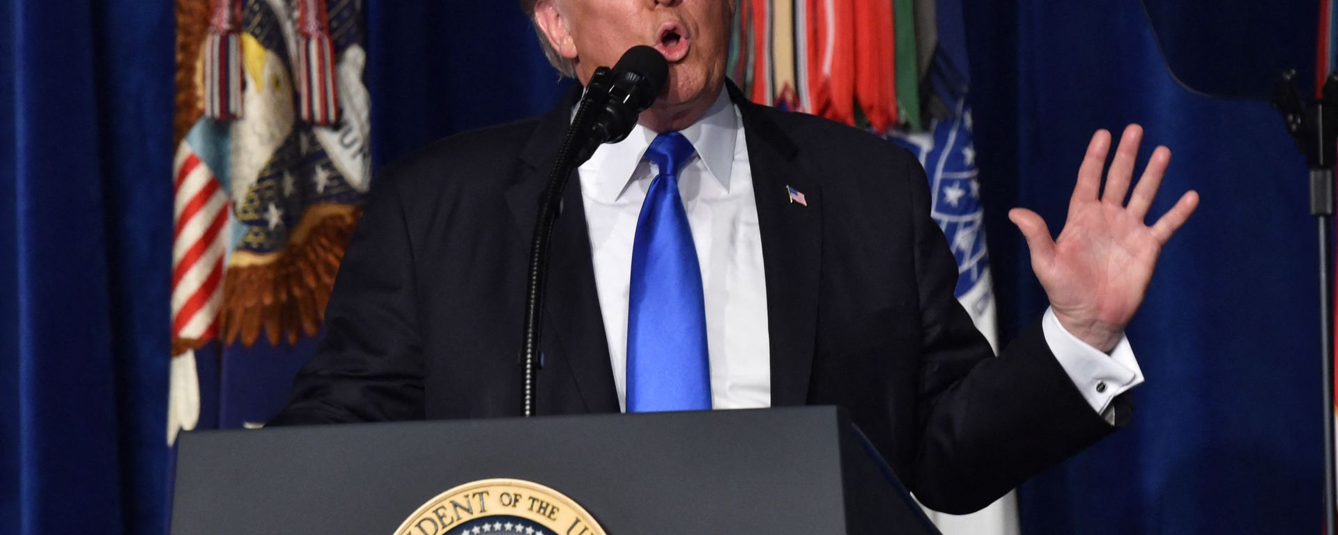 US President Donald Trump speaks during his address to the nation from Joint Base Myer-Henderson Hall in Arlington, Virginia, on August 21, 2017. - Trump Monday left the door open to a possible political agreement with the Taliban, in an address to the nation on America's strategy in the 16-year Afghan conflict. Some day, after an effective military effort, perhaps it will be possible to have a political sentiment that includes elements of the Taliban in Afghanistan, he said. US President Donald Trump speaks during his address to the nation from Joint Base Myer-Henderson Hall in Arlington, Virginia, on August 21, 2017. - Trump Monday left the door open to a possible political agreement with the Taliban, in an address to the nation on America's strategy in the 16-year Afghan conflict. Some day, after an effective military effort, perhaps it will be possible to have a political sentiment that includes elements of the Taliban in Afghanistan, he said. - Sputnik International, 1920, 09.10.2021