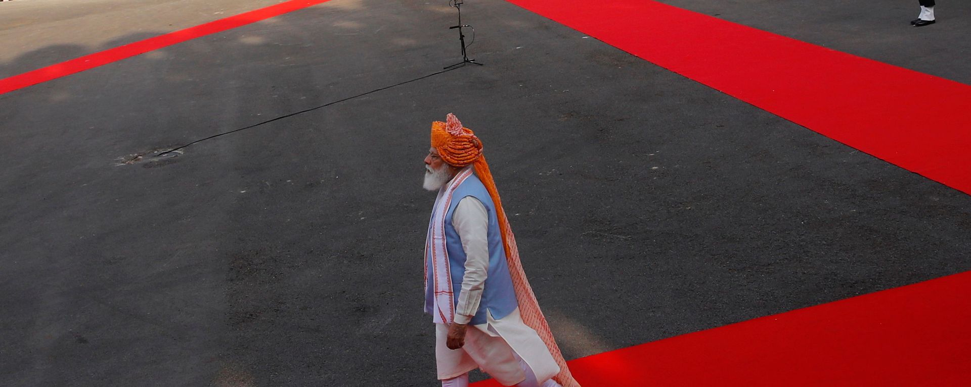 Indian Prime Minister Narendra Modi walks after inspecting the honour guard during Independence Day celebrations at the historic Red Fort in Delhi, India, August 15, 2021. Indian Prime Minister Narendra Modi walks after inspecting the honour guard during Independence Day celebrations at the historic Red Fort in Delhi, India, August 15, 2021. - Sputnik International, 1920, 24.08.2021