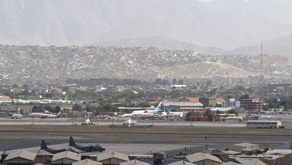 This picture taken on August 14, 2021 shows aircrafts standing on the tarmac of the airport in Kabul. This picture taken on August 14, 2021 shows aircrafts standing on the tarmac of the airport in Kabul. - Sputnik International