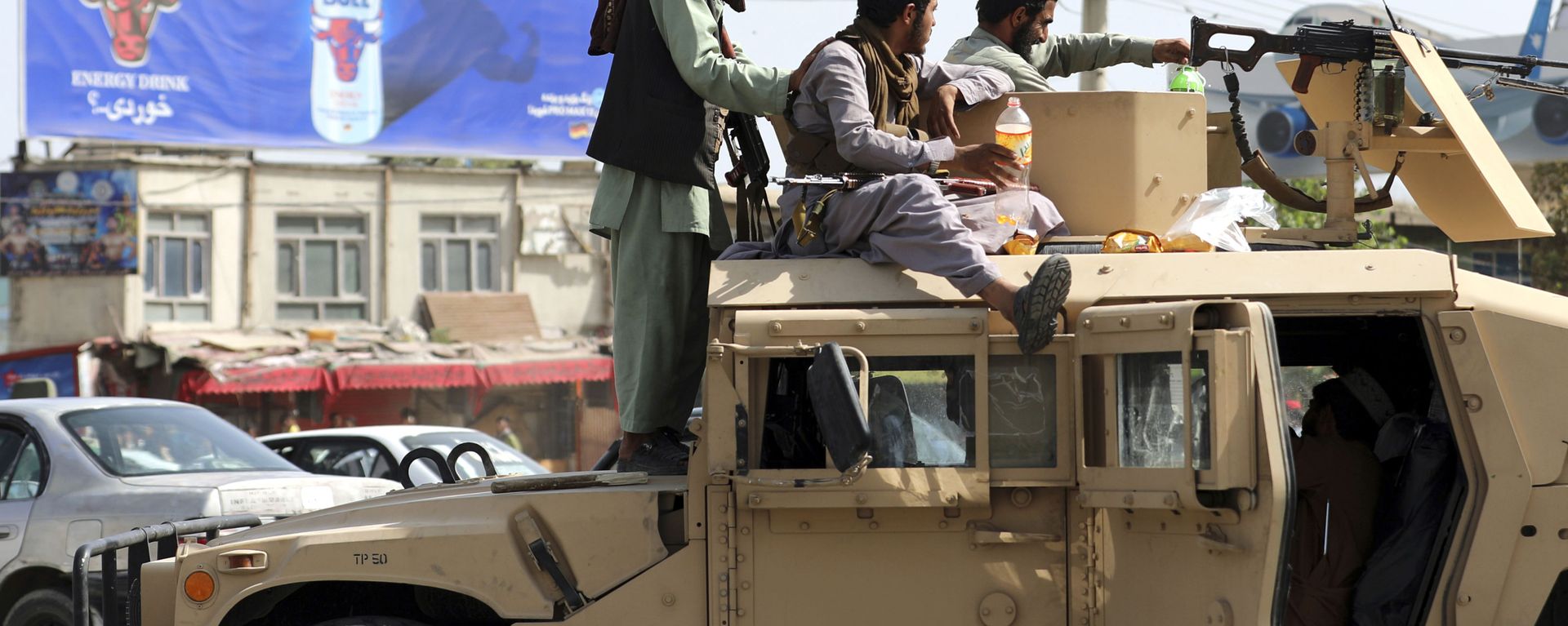 Taliban fighters stand guard in front of the Hamid Karzai International Airport, in Kabul, Afghanistan, Monday, Aug. 16, 2021. Taliban fighters stand guard in front of the Hamid Karzai International Airport, in Kabul, Afghanistan, Monday, Aug. 16, 2021. - Sputnik International, 1920, 31.08.2021