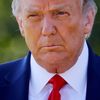 Then-U.S. President Donald Trump approaches reporters as he departs on campaign travel to Minnesota from the South Lawn at the White House in Washington, U.S., September 30, 2020 - Sputnik International