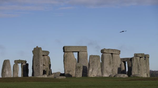 In this Tuesday, Dec. 17, 2013 file photo, visitors take photographs of the world heritage site of Stonehenge, England.  - Sputnik International
