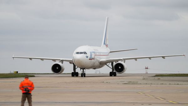 A plane carrying people who have been evacuated from Afghanistan taxis on the tarmac at Roissy Charles-de-Gaulle airport after Taliban insurgents entered Afghanistan's capital Kabul, in Paris, France, August 17, 2021. - Sputnik International