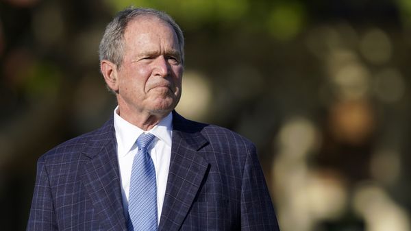 Former President George W. Bush listens to speakers during the opening ceremony of the Walker Cup golf tournament, which starts tomorrow, at Seminole Golf Club in Juno Beach, Fla., Friday, May 7, 2021. The tournament was founded by George Herbert Walker, the United States Golf Association president in 1920, who was the great-grandfather of Bush. - Sputnik International