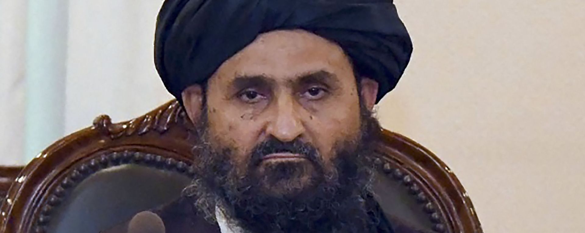In this handout photograph taken on 25 August 2020, and released by the Pakistan Foreign Ministry, Taliban co-founder Mullah Abdul Ghani Baradar talks with Pakistan's Foreign Minister Shah Mehmood Qureshi (unseen) at the Pakistan Foreign Ministry in Islamabad In this handout photograph taken on 25 August 2020, and released by the Pakistan Foreign Ministry, Taliban co-founder Mullah Abdul Ghani Baradar talks with Pakistan's Foreign Minister Shah Mehmood Qureshi (unseen) at the Pakistan Foreign Ministry in Islamabad - Sputnik International, 1920, 18.08.2021