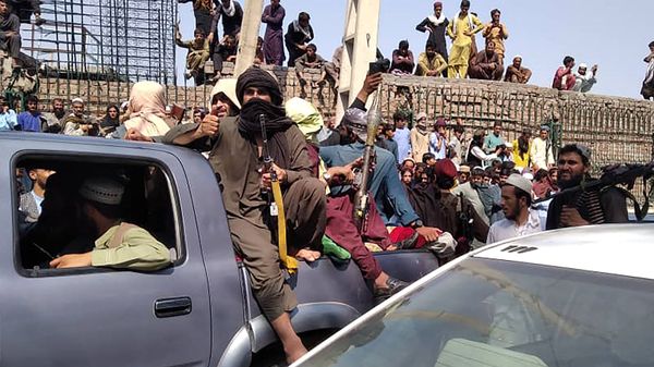 Taliban fighters sit on a vehicle along the street in Jalalabad province on August 15, 2021. - Sputnik International