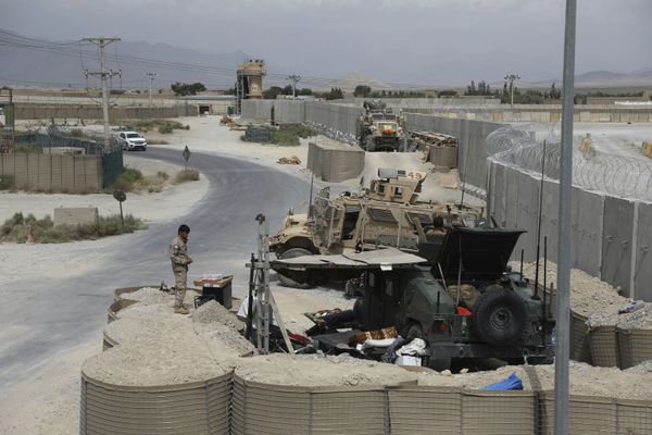 A member of the Afghan security forces stands guard after the American military left Bagram air base, in Parwan province north of Kabul, Afghanistan, Monday, 5 July 2021.  - Sputnik International