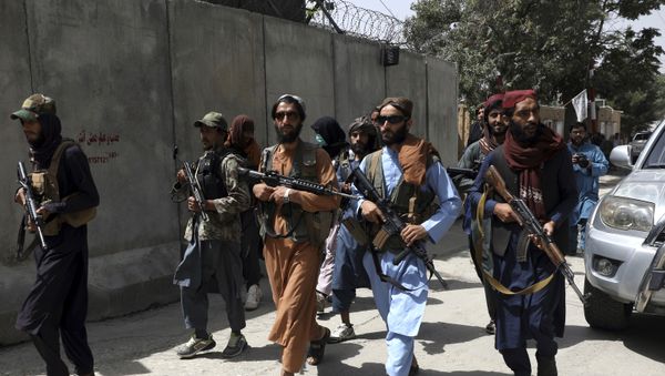 Taliban fighters patrol in Wazir Akbar Khan neighborhood in the city of Kabul, Afghanistan, Wednesday, Aug. 18, 2021. - Sputnik International