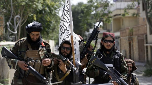 In this Aug. 19, 2021 file photo, Taliban fighters display their flag on patrol in Kabul, Afghanistan. When U.S. President Joe Biden took office early this year, Western allies were falling over themselves to welcome and praise him and hail a new era in trans-Atlantic cooperation. - Sputnik International