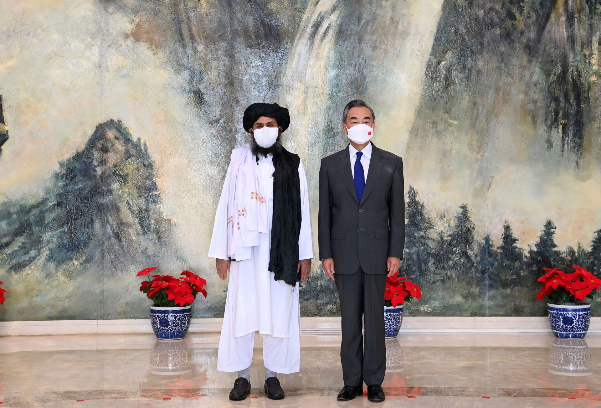Chinese State Councilor and Foreign Minister Wang Yi meets with Mullah Abdul Ghani Baradar, political chief of Afghanistan's Taliban, in Tianjin, China July 28, 2021. Picture taken July 28, 2021. Chinese State Councilor and Foreign Minister Wang Yi meets with Mullah Abdul Ghani Baradar, political chief of Afghanistan's Taliban, in Tianjin, China July 28, 2021. Picture taken July 28, 2021. - Sputnik International, 1920, 07.09.2021