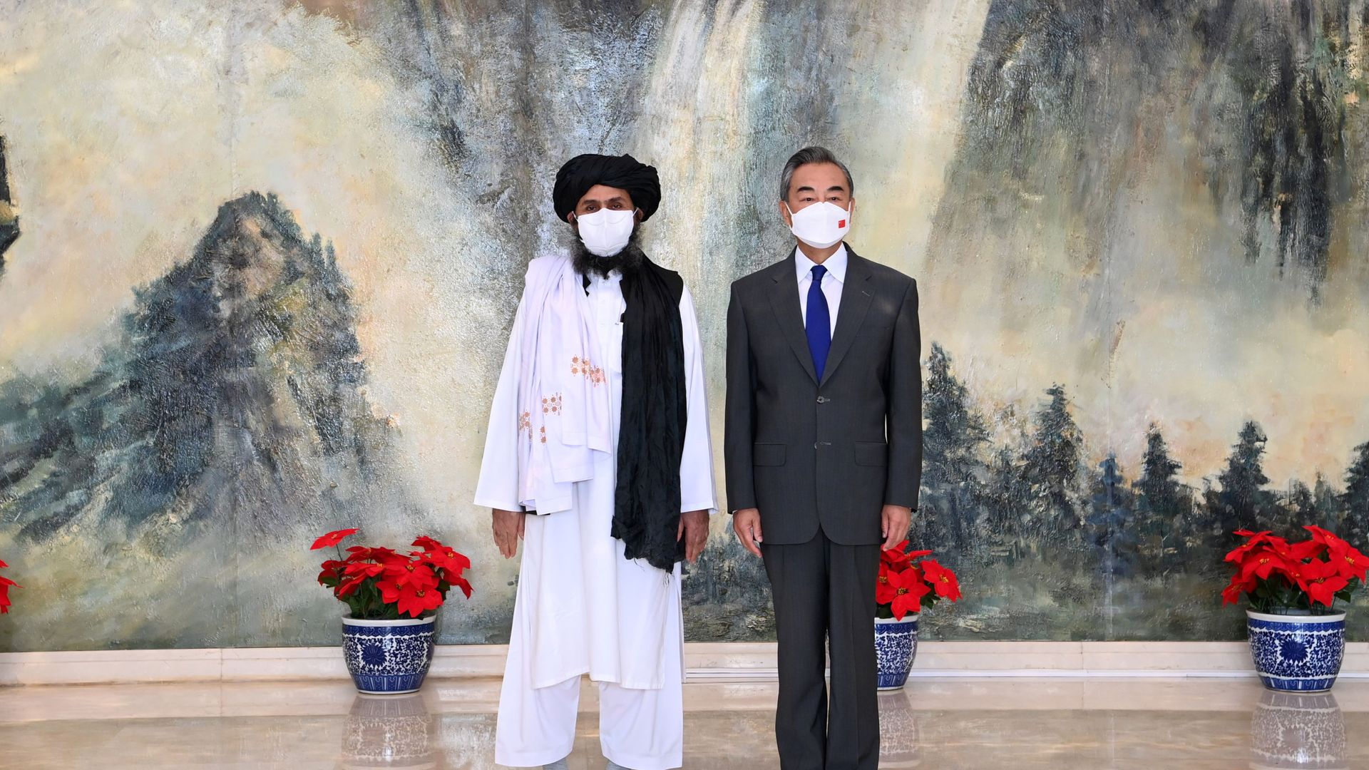 Chinese State Councilor and Foreign Minister Wang Yi meets with Mullah Abdul Ghani Baradar, political chief of Afghanistan's Taliban, in Tianjin, China July 28, 2021. Picture taken July 28, 2021. Chinese State Councilor and Foreign Minister Wang Yi meets with Mullah Abdul Ghani Baradar, political chief of Afghanistan's Taliban, in Tianjin, China July 28, 2021. Picture taken July 28, 2021. - Sputnik International, 1920, 25.10.2021