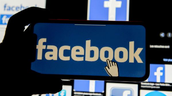  The Facebook logo is displayed on a mobile phone in this picture illustration taken 2 December 2019. - Sputnik International