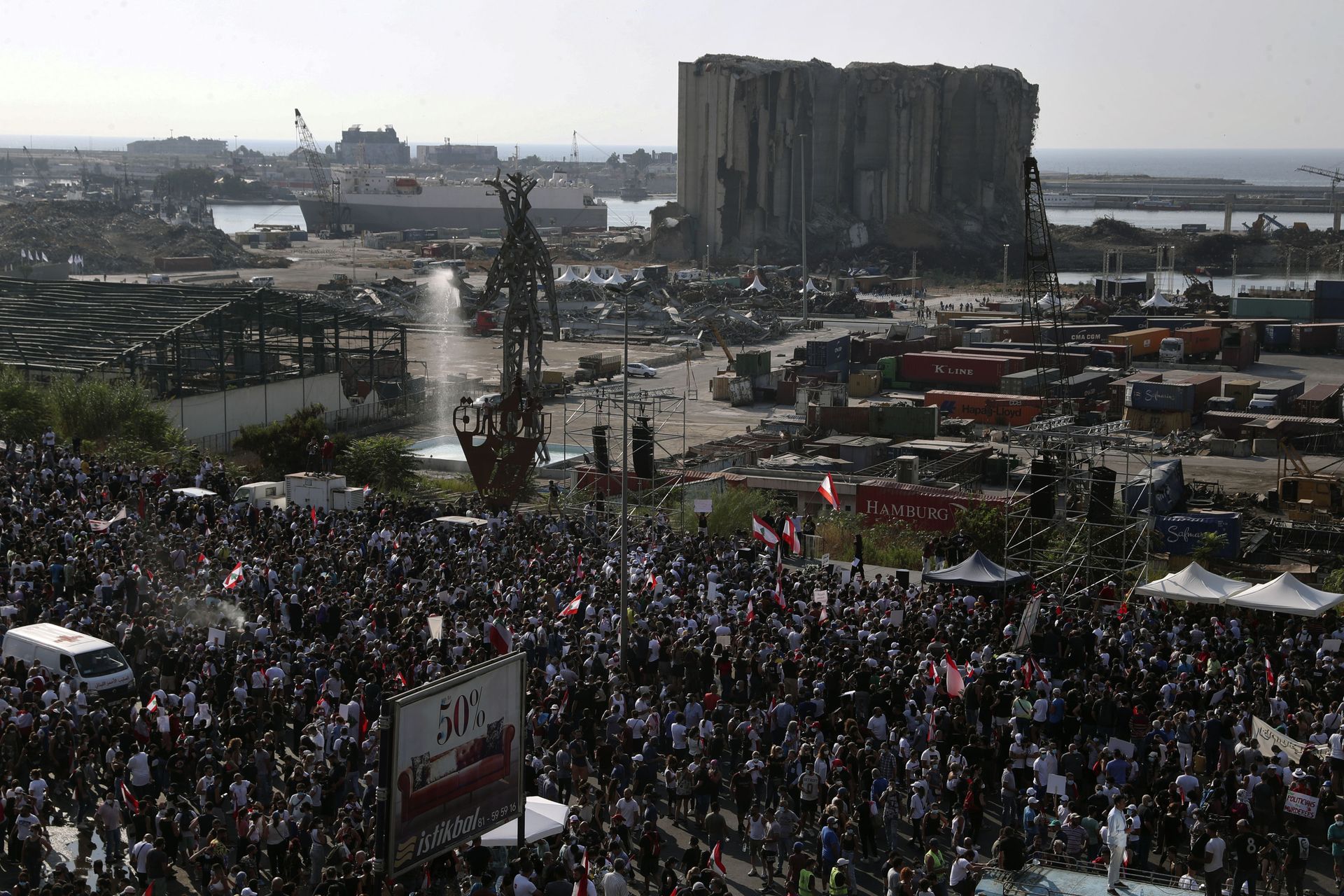 People gather outside the port to mark the first anniversary of the massive blast at Beirut's port, in Beirut, Lebanon, Wednesday, Aug. 4, 2021. People gather outside the port to mark the first anniversary of the massive blast at Beirut's port, in Beirut, Lebanon, Wednesday, Aug. 4, 2021. - Sputnik International, 1920, 14.10.2021