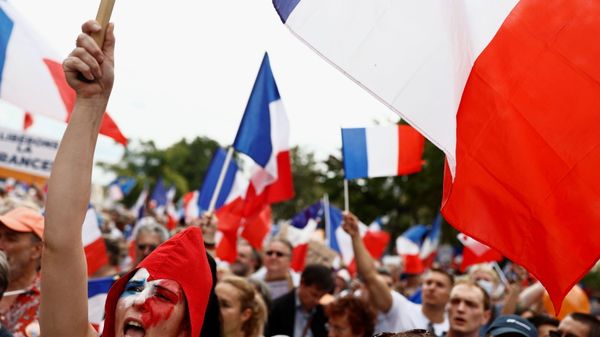 Protesters attend a demonstration against France's restrictions, including a compulsory health pass, to fight the coronavirus disease (COVID-19) outbreak, in Paris, France, August 21, 2021. - Sputnik International