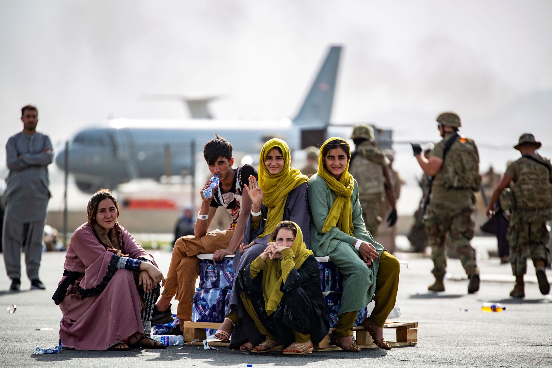Evacuee children wait for the next flight after being manifested at Hamid Karzai International Airport, in Kabul, Afghanistan, August 19, 2021 Evacuee children wait for the next flight after being manifested at Hamid Karzai International Airport, in Kabul, Afghanistan, August 19, 2021 - Sputnik International, 1920, 07.09.2021