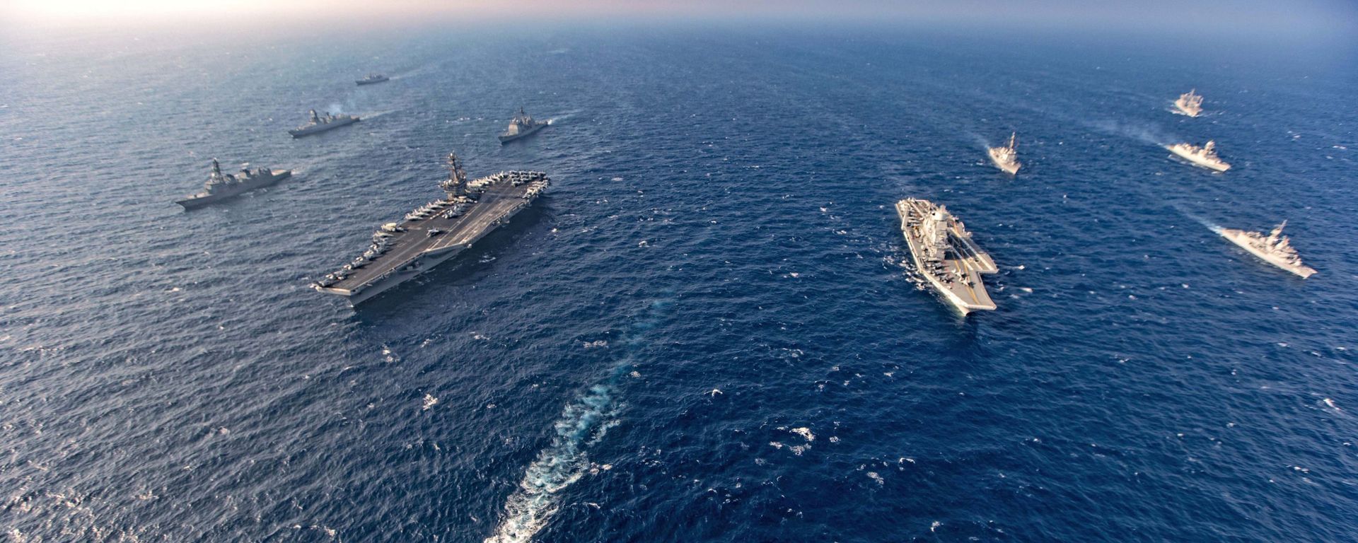 Aircraft carriers and warships participate in the second phase of Malabar naval exercise, a joint exercise comprising of India, US, Japan and Australia, in the Northern Arabian Sea on Tuesday, Nov. 17, 2020. Aircraft carriers and warships participate in the second phase of Malabar naval exercise, a joint exercise comprising of India, US, Japan and Australia, in the Northern Arabian Sea on Tuesday, Nov. 17, 2020. - Sputnik International, 1920, 26.08.2021