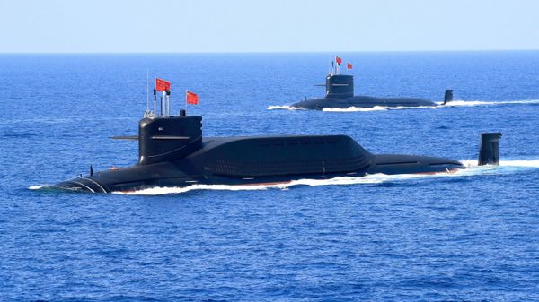 A nuclear-powered Type 094A Jin-class ballistic missile submarine of the Chinese People's Liberation Army (PLA) Navy is seen during a military display in the South China Sea April 12, 2018 A nuclear-powered Type 094A Jin-class ballistic missile submarine of the Chinese People's Liberation Army (PLA) Navy is seen during a military display in the South China Sea April 12, 2018 - Sputnik International