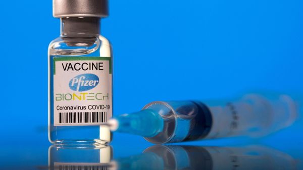 A vial labelled with the Pfizer-BioNTech coronavirus disease (COVID-19) vaccine is seen in this illustration picture taken March 19, 2021 - Sputnik International