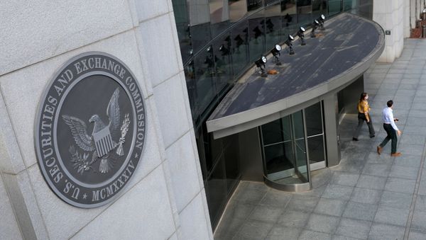 People exit the headquarters of the U.S. Securities and Exchange Commission (SEC) in Washington, D.C., U.S., May 12, 2021. Picture taken May 12, 2021 - Sputnik International