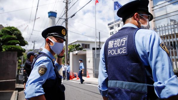 Police officers stand in front of the Polish Embassy, where Belarusian sprinter Krystsina Tsimanouskaya is staying, in Tokyo, Japan August 3, 2021 - Sputnik International