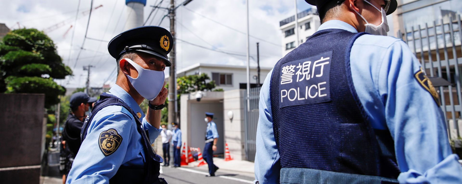 Police officers stand in front of the Polish Embassy, where Belarusian sprinter Krystsina Tsimanouskaya is staying, in Tokyo, Japan August 3, 2021 - Sputnik International, 1920, 25.08.2021