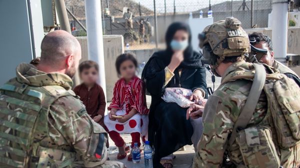 Members of the UK Armed Forces who continue to take part in the evacuation of entitled personnel from Kabul airport, in Kabul, Afghanistan August 19-22, 2021 - Sputnik International