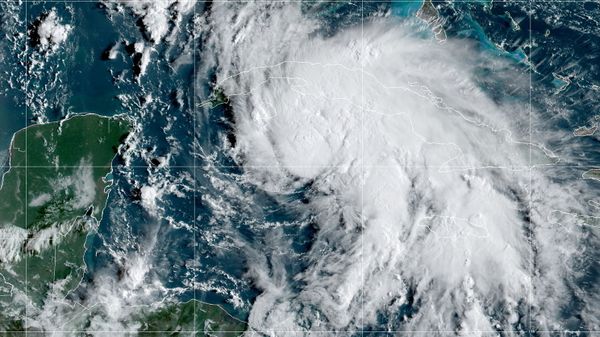 A satellite image shows Tropical Storm Ida after forming in the Caribbean, about 75 miles (125 kilometers) north-northwest of Grand Cayman, August 27, 2021. - Sputnik International
