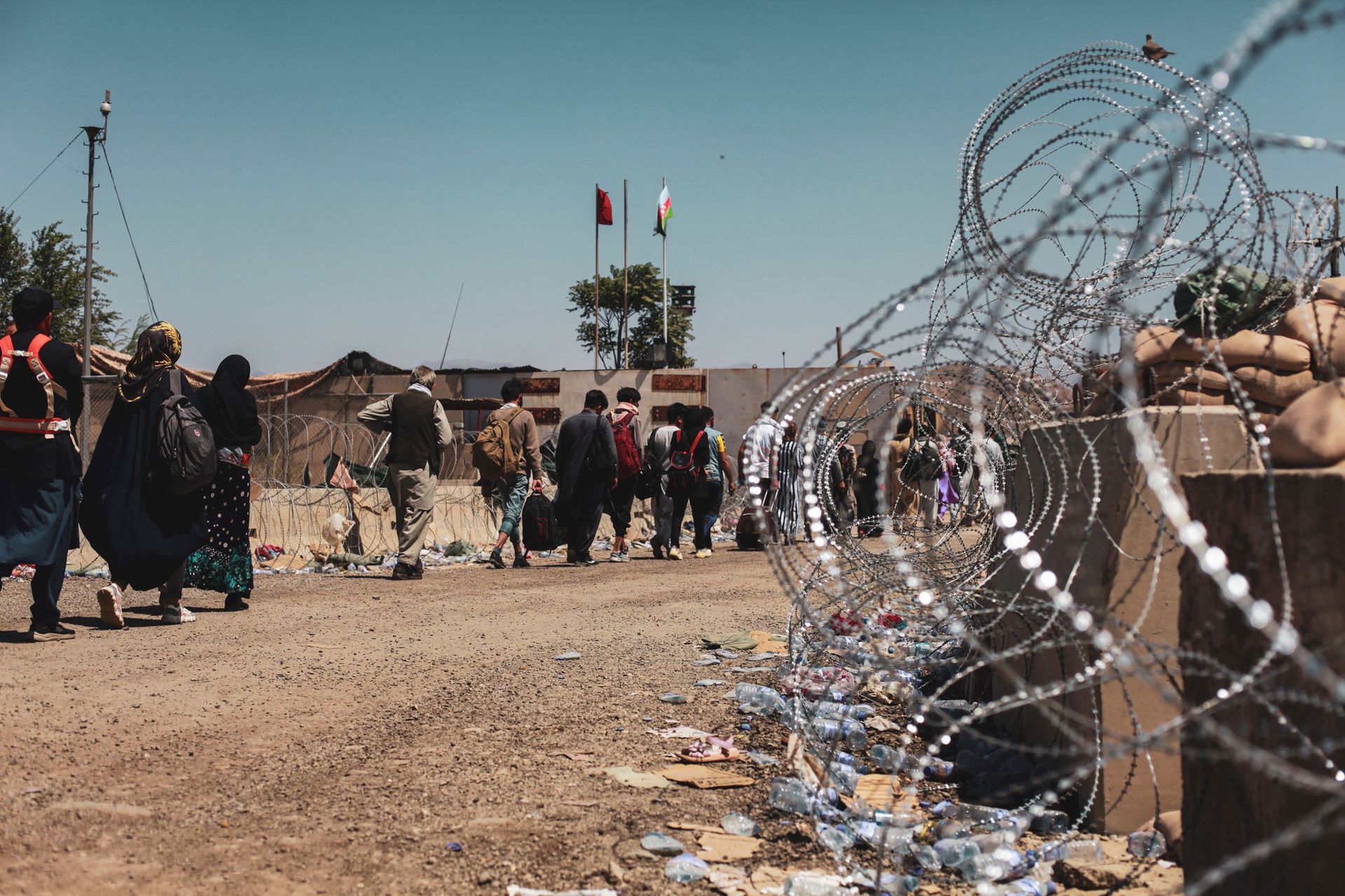 Evacuees walk to be processed during an evacuation at Hamid Karzai International Airport, Kabul, Afghanistan, August 25, 2021. Picture taken August 25, 2021 - Sputnik International, 1920, 16.09.2021